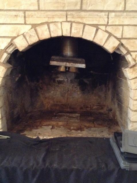 Completing a chimney inspection and sweep and providing an estimate for needed repairs