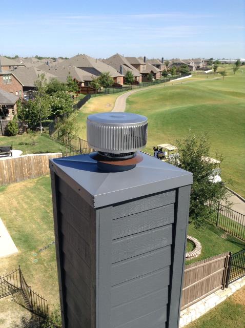 Installing a custom chimney cap and a spark arrestor on a prefabricated chimney