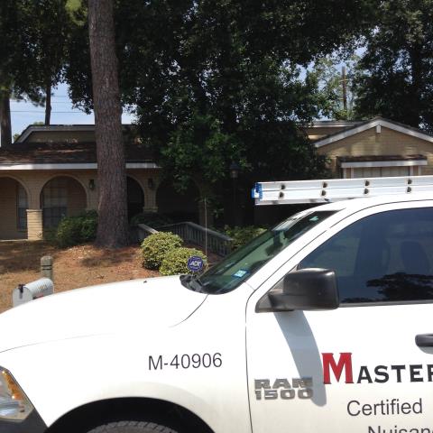 Giving an estimate for the removal of wildlife in the attic.