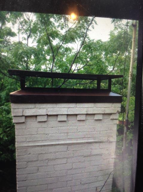 Installing a custom chimney cap to keep wildlife out of flue