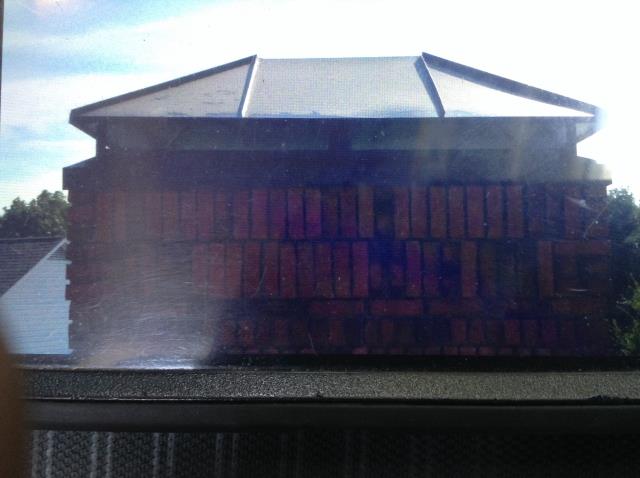 Completing the flash and seal and waterproofing on the chimney, 