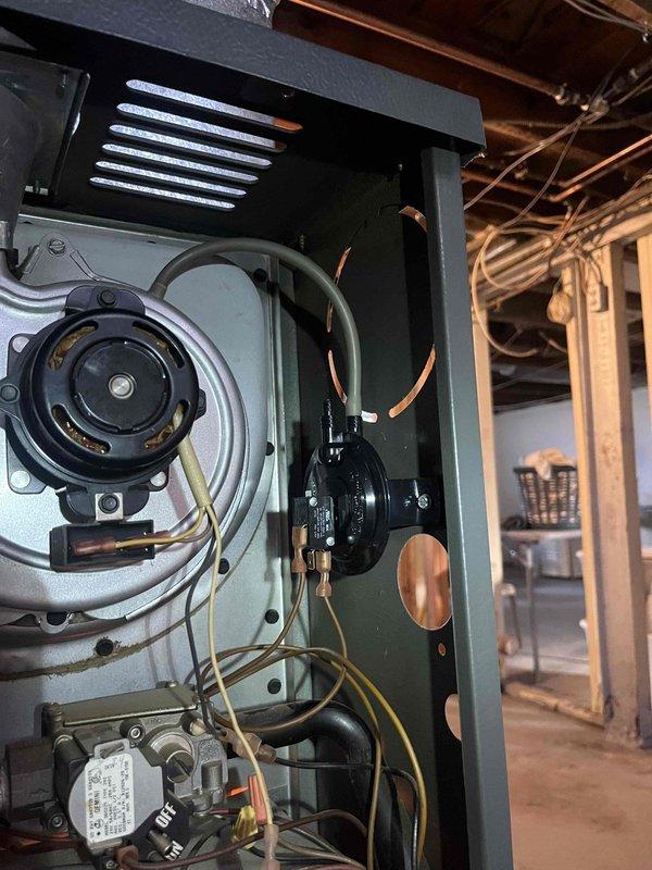 Diagnosed and serviced a 20-year-old furnace with intermittent operation issues. Inspection of the blower motor assembly and gas valve revealed significant wear and debris accumulation affecting consistent ignition. Cleaned critical components, adjusted connections, and verified proper operation through multiple test cycles to restore reliable heating function.