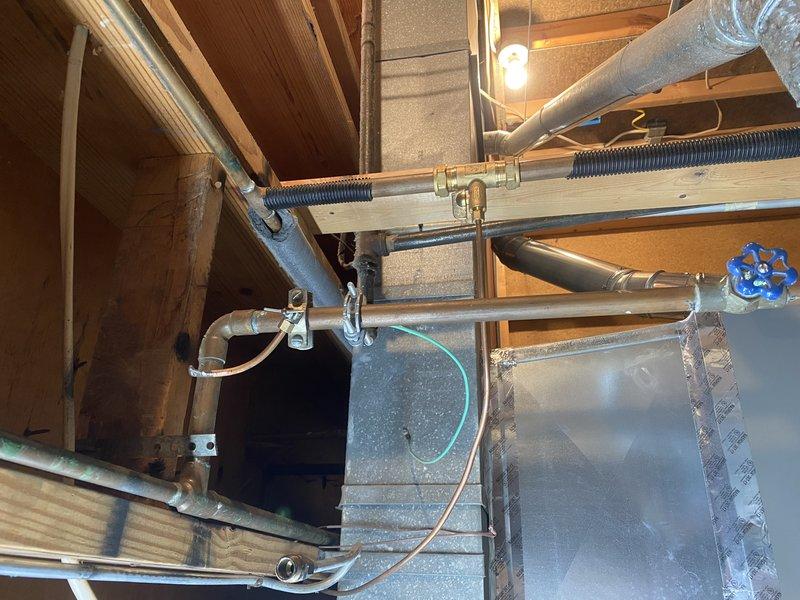 Completed replacement of cast iron waste lines with PVC for water closet, lavatory, and tub-shower assembly per permit requirements. Installed new piping through floor joists with proper supports and connections, including appropriate venting. Prepared system for rough inspection before owner completes wall, ceiling, and floor finishes.