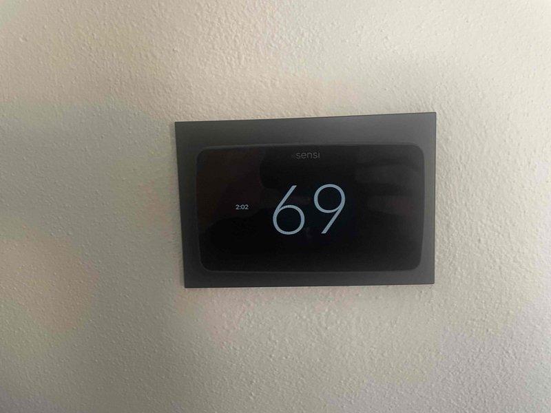 Performed scheduled heating maintenance on 9-year-old furnace and heat pump system. Inspected and replaced air filter with clean unit. Verified proper thermostat operation with Sensi digital control showing appropriate temperature readings. System is functioning correctly; customer enrolled in regular maintenance program.