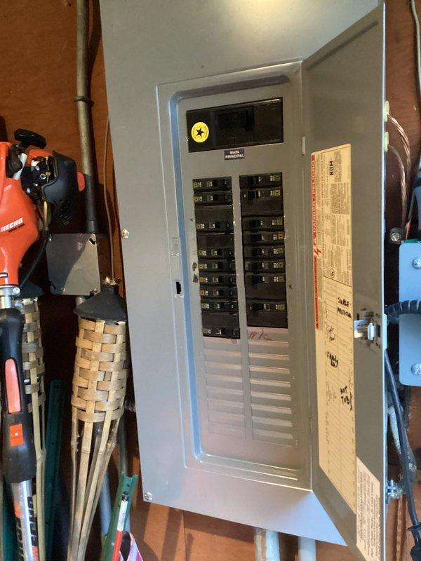 Conducted comprehensive site assessment for EV charging station installation, including evaluation of existing electrical panel capacity (200A service) and available breaker spaces. Inspected exterior meter and service entrance to determine feasibility of dedicated circuit installation. Documented current electrical infrastructure to prepare detailed estimate for Level 2 charging station with appropriate amperage rating based on client's vehicle specifications.