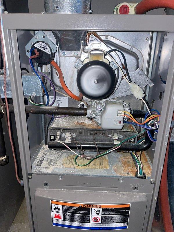 Diagnosed non-functioning furnace (10+ years old) with blower motor and control board issues. Performed comprehensive system inspection, cleaned connections, and verified proper operation after service. Unit is now functioning correctly with normal heating cycles.