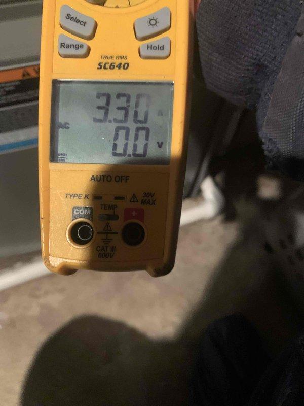 Performed scheduled heating tune-up on 2-year-old unit located in basement. Conducted comprehensive inspection including electrical measurements with multimeter showing 3.30 reading and temperature verification at 35.5°F. System is functioning properly with all components in good working condition.