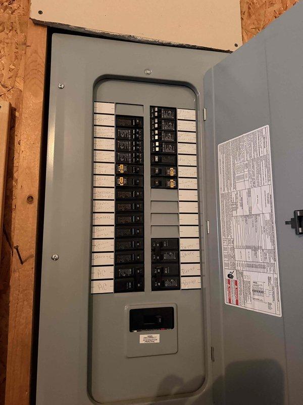 Conducted site assessment for potential natural gas generator installation. Inspected and documented existing electrical panel configuration, noting circuit distribution and load allocation across multiple household systems. Customer seeking information only at this time; no installation work performed.