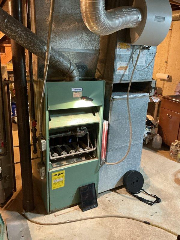 Performed routine heating tune-up on 60+ year old furnace located in basement. Inspected burner assemblies and internal components, confirmed proper operation of the system. Replaced air filter (20x25x1) and checked all connections to ductwork and ventilation system.