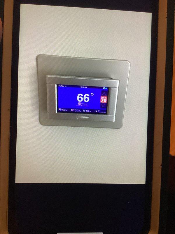 Responded to no heat call for unit under 10 years old with reported pilot light issue. Inspected programmable thermostat (displaying 66°F with 70°F target temperature) and found system components functioning properly. Relit pilot light, verified proper ignition sequence and confirmed heating operation restored to specification.