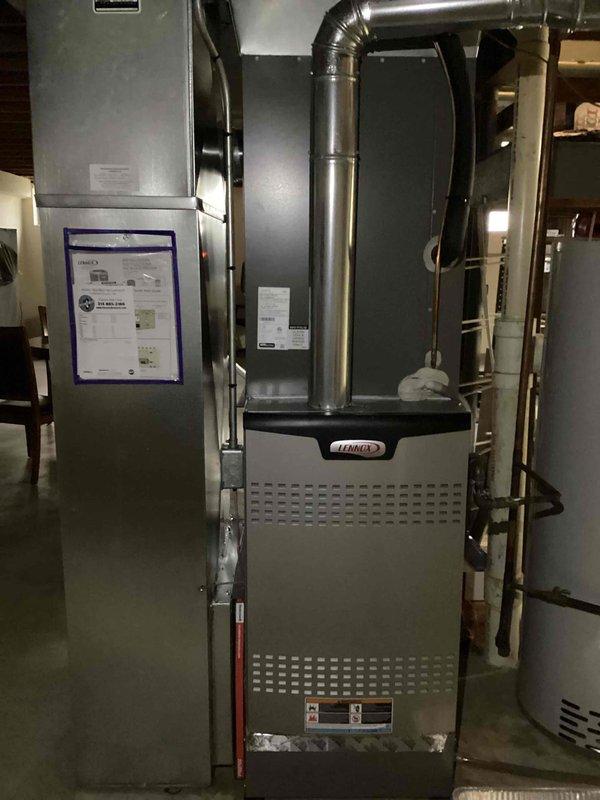 Completed annual heating maintenance tune-up on Lennox furnace system. Inspected and verified proper operation of digital thermostat, checked all connections and ductwork throughout the basement installation. System is functioning correctly with no issues identified.