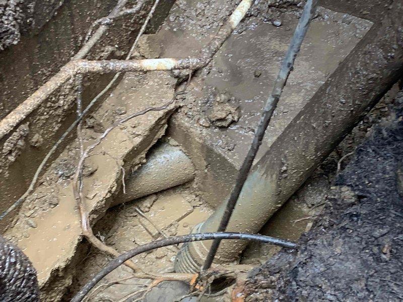 Responded to a commercial basement flooding emergency. Excavated and exposed main drainage line to address blockage causing backup. Inspected HVAC system for potential water damage, with particular attention to electrical components and connections that may have been compromised by flooding.