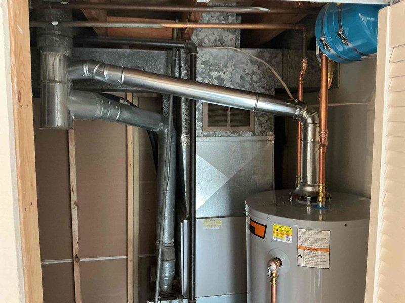 Successfully installed a 50-gallon tall gas water heater in utility room, connecting all necessary copper piping and ensuring proper ventilation. Completed all connections to existing plumbing system and verified safe operation of the unit. Final inspection confirmed no leaks and proper functioning of all components.
