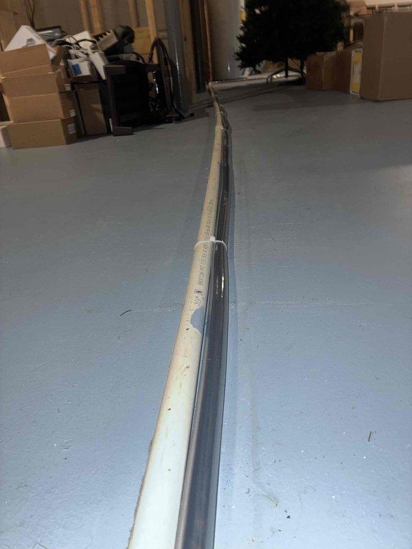 Responded to recall service for recently installed furnace system where inspector noted mold and clogged condensate lines. Inspected the PVC condensate drainage system in basement, identified accumulation of residue where pipes meet floor and along pipe runs. Replaced affected condensate tubes/pipes on all three HVAC systems as requested to resolve drainage issues and prevent future mold development.