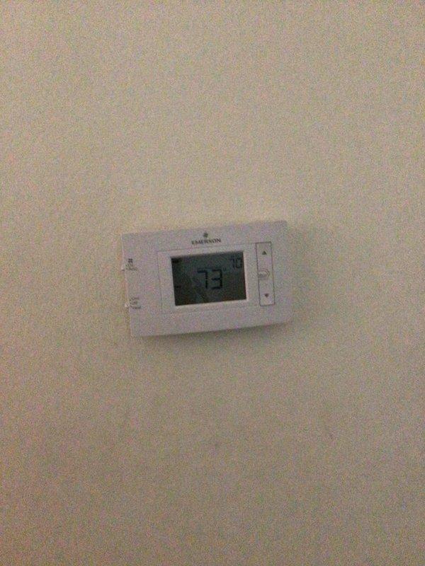 Performed comprehensive heating tune-up on 23-year-old furnace located in basement. Inspected and cleaned all internal components with front panel removed, and verified thermostat was functioning correctly with temperature reading at 73°F. No immediate issues requiring repair were identified during the preventative maintenance service.