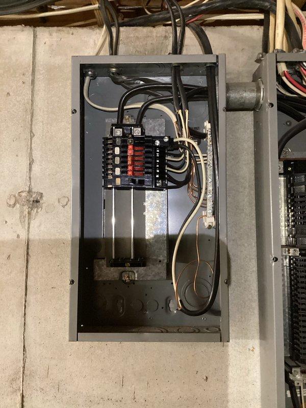 Conducted comprehensive electrical inspection of residential property, focusing on the main circuit breaker panel and exposed ceiling electrical runs. Identified several concerns including improper wire routing through ceiling joists, inadequate wire securing methods, and potential overloaded circuits in the main panel as evidenced by tripped breakers. Recommended professional remediation to address code compliance issues and safety concerns.