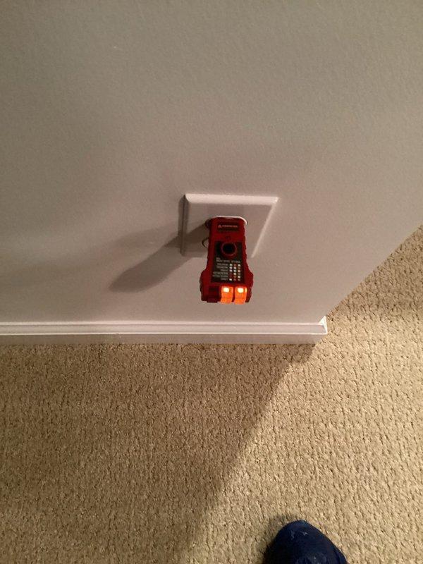 Completed comprehensive electrical inspection of residential property, testing outlet voltage/polarity with digital tester and examining main circuit breaker panel. Panel inspection revealed standard residential wiring configuration with appropriate color coding and no visible signs of deterioration or hazardous conditions.