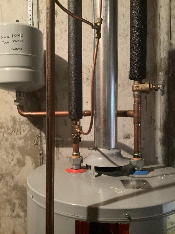 Successfully installed a 50-gallon gas water heater with permit #26PLU-04213. Installation included proper connection of copper piping, mounting of expansion tank, and setup of gas line with required fittings. All components were installed to code with appropriate valves and insulation, and ID sticker JP 000097 was applied as required.