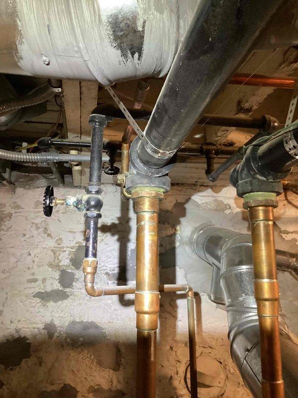 Performed annual maintenance tune-up on 26-year-old Dunkirk boiler system. Inspected all copper piping infrastructure, brass fittings, and ventilation ducts for proper operation. System is functioning correctly with no issues identified; customer informed of completed service.