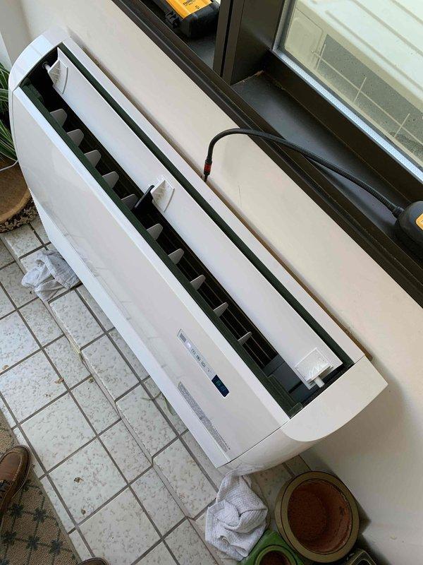 Performed leak search on mini-split system installed in November. Inspected wall-mounted indoor unit and associated refrigerant lines for potential leak sources. Unit was operational but service was required due to suspected refrigerant loss.