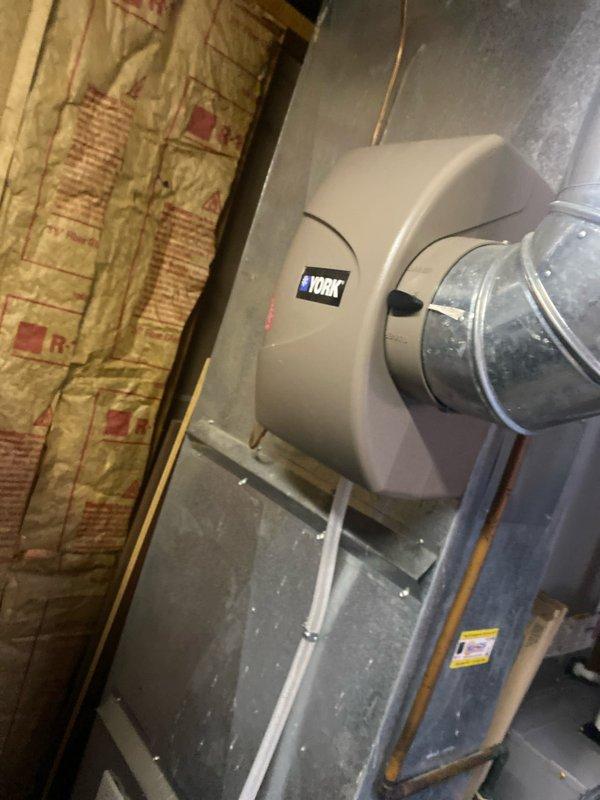 Performed scheduled heating tune-up on 6-year-old York furnace located in basement. Inspected system components, ductwork, and connections; unit is functioning properly with no issues detected. Filter was checked and system is operating within normal parameters.