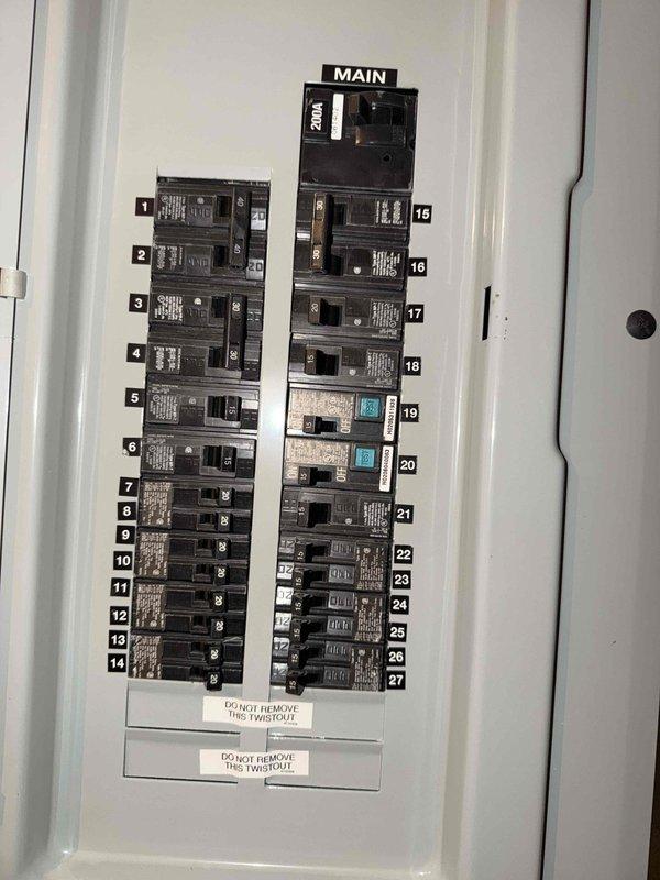 Completed free electrical inspection of property. Inspected main electrical service panel containing 27-circuit capacity with properly labeled breakers and main disconnect. Digital utility meter was examined and found to be in good working condition with no visible damage or safety concerns.