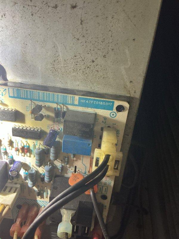 Diagnosed furnace no-heat issue on Heil unit of undetermined age. Inspection revealed faulty electronic control board with visible dust accumulation and debris on housing surfaces. Replaced defective circuit board (part #HR-F70185017) and verified proper system operation with successful heat cycle.