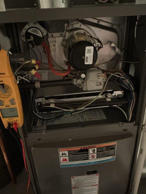 Responded to no heat call for 10+ year old furnace located in basement that was blowing cool air. Performed comprehensive system inspection, including multimeter testing of electrical components and blower motor functionality. Replaced dirty air filter with new one, which restored proper airflow and resolved the heating issue.