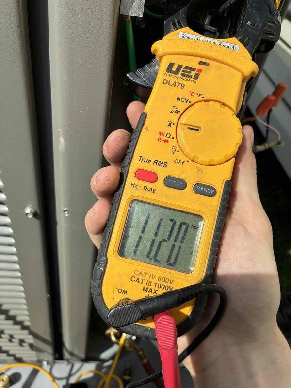 Responded to service call for 11-month old A/C unit making loud noise. Performed electrical diagnostic testing with UEi DL479 clamp meter, measuring amperage (0.186) and voltage (17.0) to identify potential electrical issues. Unit is now operating within normal parameters.