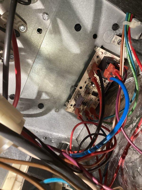 Diagnosed U10 indoor air handler unit exhibiting no-cool condition despite operational outdoor unit. Inspection revealed faulty control board connections causing indoor fan failure. Repaired loose wire connections on circuit board and verified proper system operation with restored airflow and cooling.