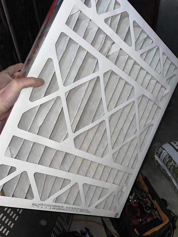 Performed routine cooling tune-up on a 10-year-old air conditioning unit located in backyard. Inspected and replaced air filter with new pleated filter to ensure proper airflow. Noted condenser coil had accumulated dust and debris which was cleaned to improve system efficiency and performance.