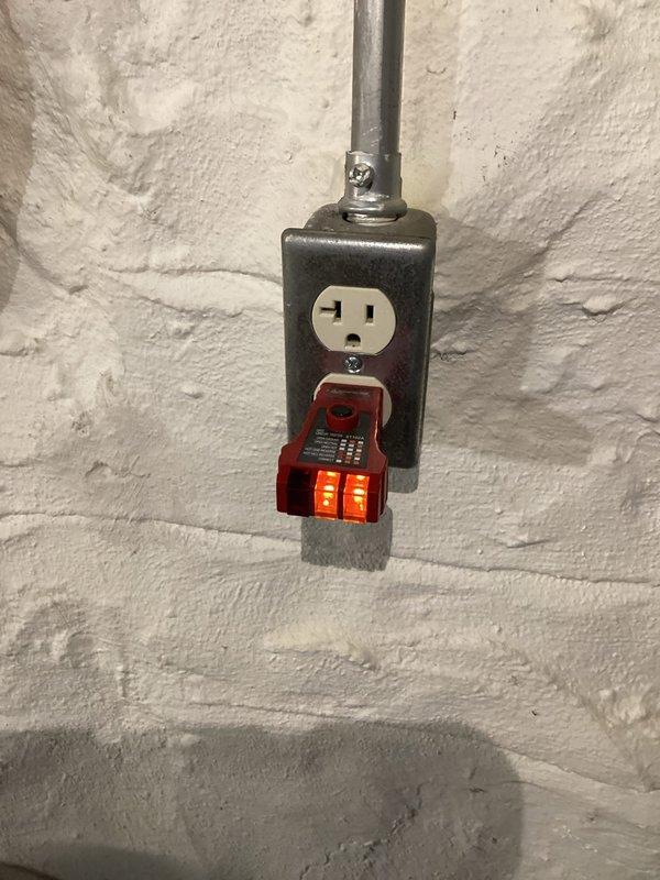 Performed complimentary electrical inspection of residence. Tested outlet functionality with circuit analyzer, confirming proper voltage and ground connection. Examined main electrical panel, noting multiple circuits with handwritten labels; observed standard breakers and specialized GFCI protection for critical areas including stove circuit. No immediate safety hazards identified.