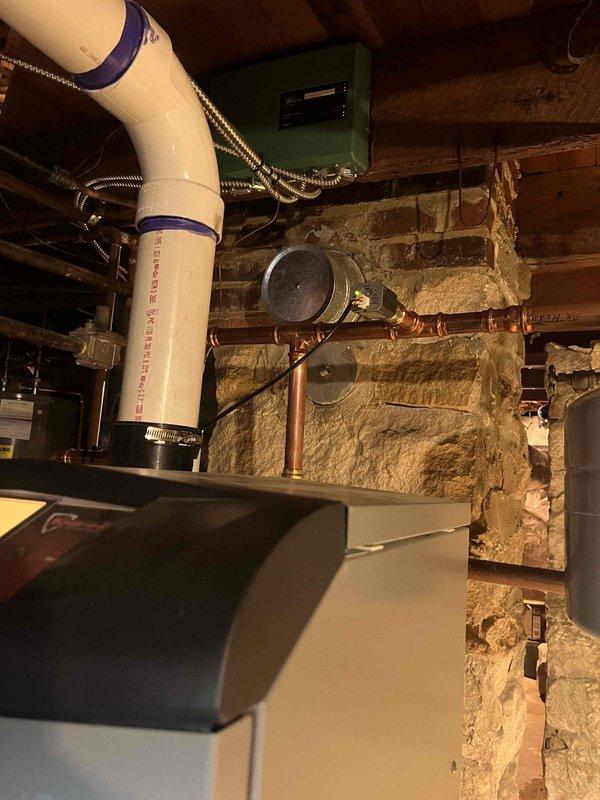 Responded to service call for newly installed boiler displaying "maintenance needed/blocked" error. Inspected system pressure (reading approximately 115-120 PSI) and temperature (approximately 70-80°F), verified all connections were secure and properly installed. Cleared blockage in system and reset maintenance indicator; boiler now functioning normally.