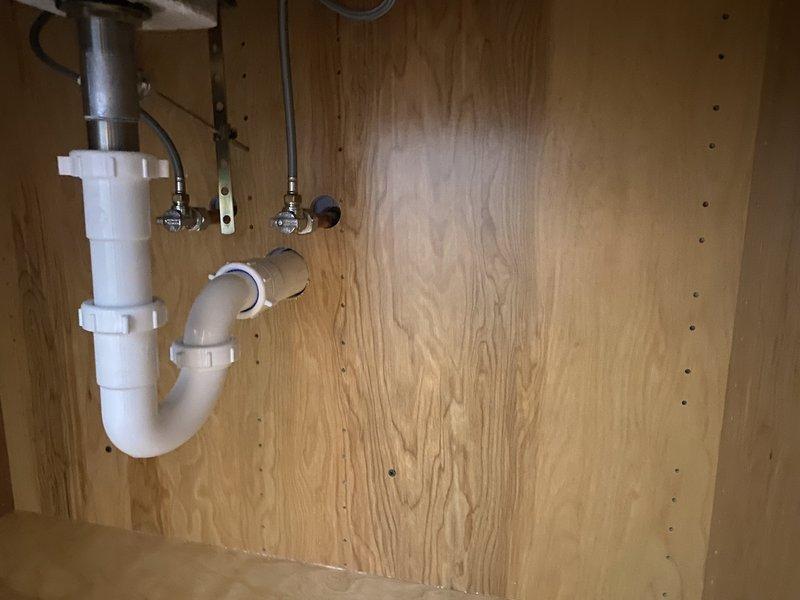 Successfully installed a 50-gallon gas water heater as part of the first phase of a multi-stage bathroom renovation project. Completed PVC drain replacement for bathroom fixtures and installed new quarter-turn water supply valves. Verified proper venting and all connections are secure with no leaks detected.