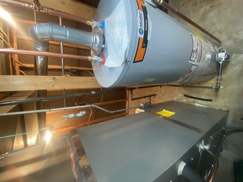 Successfully installed a 50-gallon gas water heater as part of the first phase of a multi-stage bathroom renovation project. Completed PVC drain replacement for bathroom fixtures and installed new quarter-turn water supply valves. Verified proper venting and all connections are secure with no leaks detected.