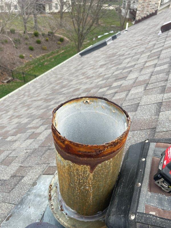 Successfully installed a 6" class B flue cap on the weathered chimney system as scheduled. Removed and properly disposed of the previous cap which showed significant corrosion and rust damage. New installation provides proper ventilation while preventing water intrusion and debris entry.