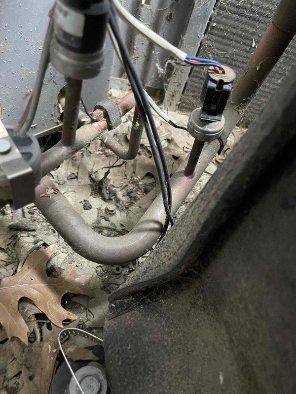 Successfully replaced faulty suction temperature sensor and capacitor on Lennox HVAC system to restore proper heating and cooling functionality. System was heavily contaminated with dust and debris requiring thorough cleaning of components. Customer enrolled in preventative maintenance agreement upon completion of repair.