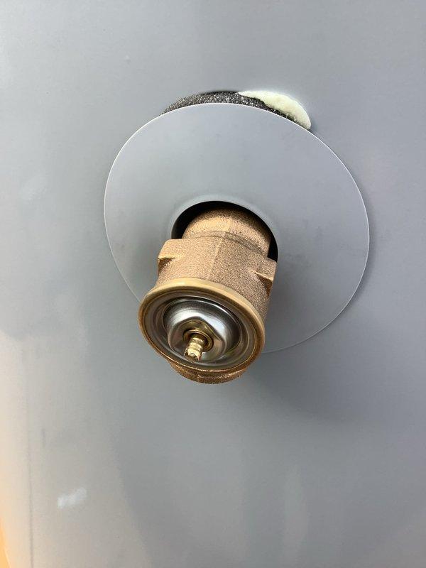 Completed installation of a 50-gallon tall gas water heater with 3/4" pressure reducing valve. Installed proper water supply connections and verified level placement of unit. Work performed under permit #26PLU-04811 with ID sticker JP000097 (Bret Lux).