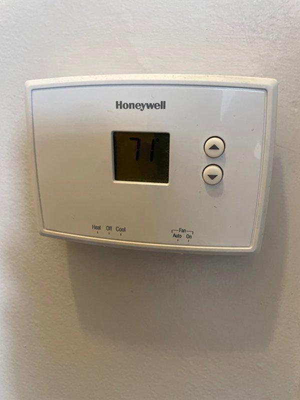 Responded to service call for thermostat connectivity issue on 10+ year old residential HVAC system. Upon inspection, found Honeywell thermostat displaying temperature but not properly communicating with furnace unit. Diagnosed and resolved connection problem between thermostat and main unit, restoring full system functionality and temperature control capability.
