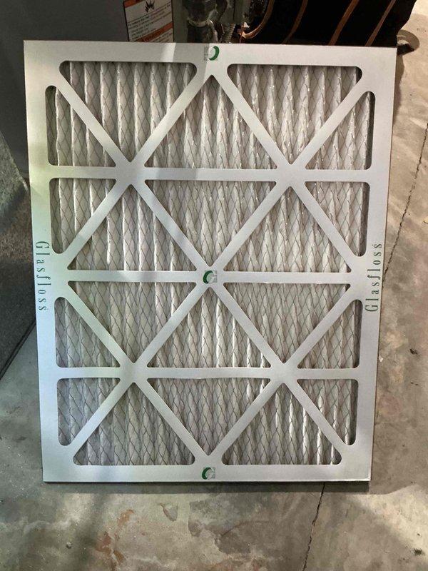 Performed routine cooling tune-up on 10-year-old A/C system located on side of house. Inspected and cleaned blower motor assembly and components, confirming proper operation of all electrical connections. Replaced air filter with new Glasfloss unit, ensuring optimal airflow and system efficiency.