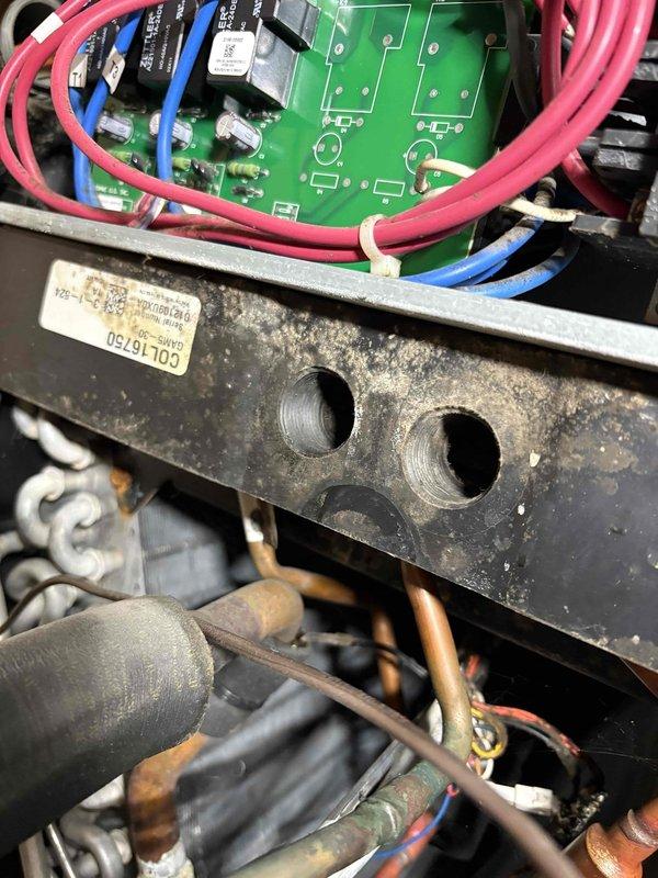 Diagnosed no heat issue in Unit 10 basement system. Inspection revealed electrical connection issues with degraded wiring insulation and accumulated dust/grime at junction box. Serviced control board connections and secured loose wiring with proper fasteners to restore heating function.