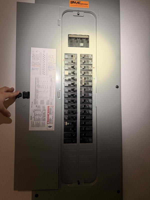 Completed comprehensive electrical home audit, including thorough inspection of main electrical panel containing approximately 20-24 circuit breakers with organized wire bundles. Examined panel directory and wiring connections for safety compliance, documented existing electrical infrastructure with detailed photographs for reference, and verified proper circuit labeling to ensure household electrical system meets current safety standards.