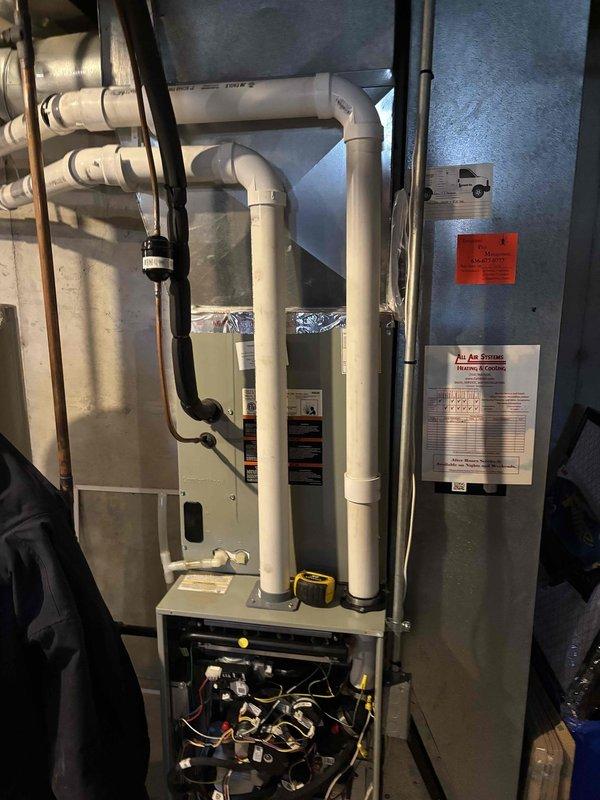 Replaced 2" PVC exhaust flue on residential furnace system that was previously scoped by technician. Installation included approximately 4' of new PVC pipe and a 2" elbow with proper connections secured using PVC cement. Verified proper ventilation pathway and system functionality after completion.