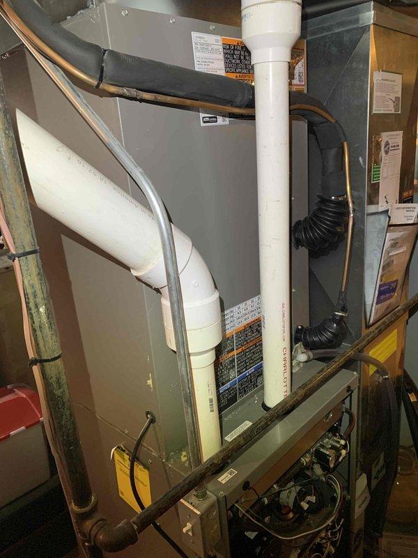 Responded to urgent thermostat alert on a furnace unit less than one year old. Performed diagnostic inspection of the system, including examination of PVC ventilation pipes, condensation drainage, and electrical connections. Verified proper operation of all components and confirmed the thermostat alert was resolved.