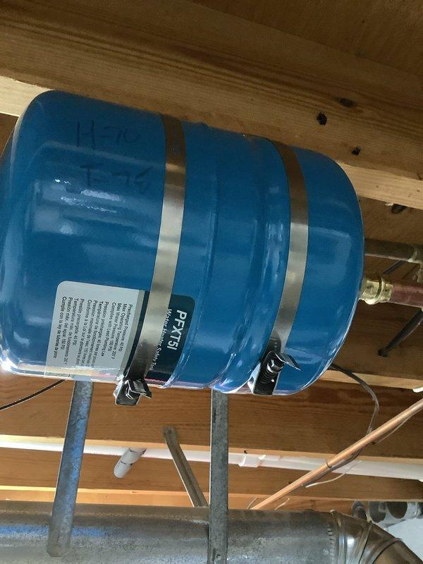 Successfully installed a new 40-gallon gas water heater with proper copper piping connections for hot and cold water lines. Removed old unit, positioned new heater, and secured the expansion tank to the ceiling joists with metal brackets. All connections were properly fitted and tested for leaks.