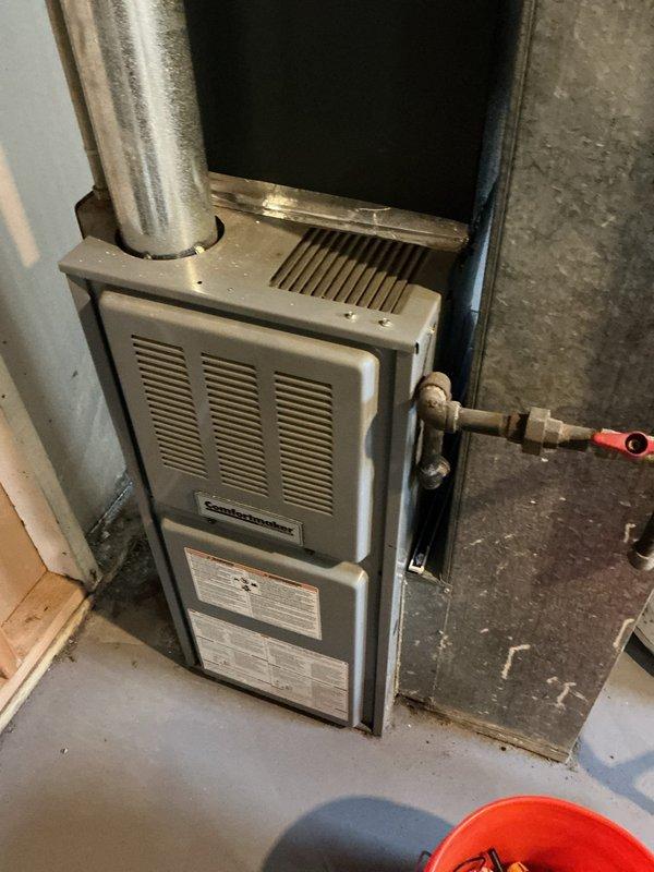 Performed heating system tune-up on 15-year-old furnace that customer reported was emitting odors during operation. Inspected gas line connections, exhaust venting system, and evaluated thermostat functionality (currently set to ECO mode). System is operational but recommended regular filter changes and discussed potential causes of odor which may require additional air quality solutions.