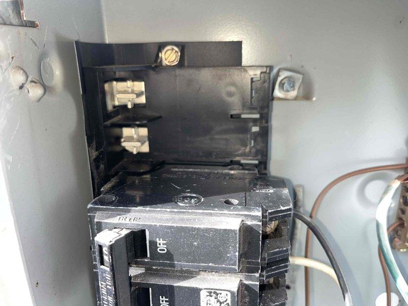 Responded to service call for non-functioning mini split in kitchen area. Diagnosed faulty electrical relay/connector with visible wear and dust accumulation. Checked circuit breaker panel, which showed power to the unit, and replaced damaged component to restore system operation.