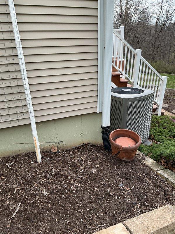 Conducted a site walk-through with Ameren engineer to assess the existing Lennox HVAC system. Documented the outdoor condenser unit placement, refrigerant line routing, and electrical connections through comprehensive photography for evaluation purposes.
