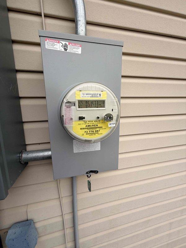 Conducted a free electrical inspection service, examining the exterior utility meter and interior control panel. Meter was found properly installed with no visible damage, displaying normal readings with proper connections to the electrical system. Interior control panel inspection revealed a properly mounted circuit board with intact relays, terminal blocks, and appropriately secured wiring connections.