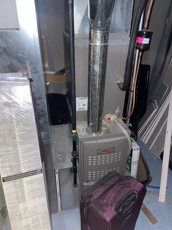 Performed preventative maintenance on a 6-year-old Lennox furnace located in basement. Inspected system components, ductwork, and associated copper piping for proper operation. Verified Honeywell thermostat functionality, confirming proper temperature display (70°F) and heating mode operation.